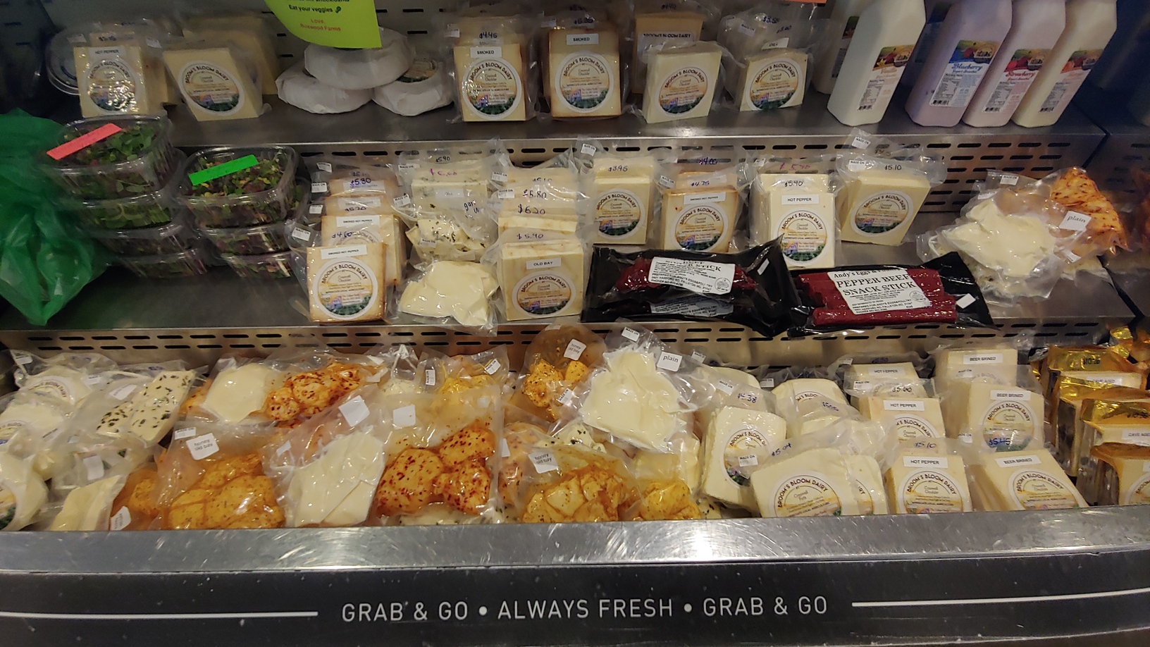 Brooms Bloom dairy case