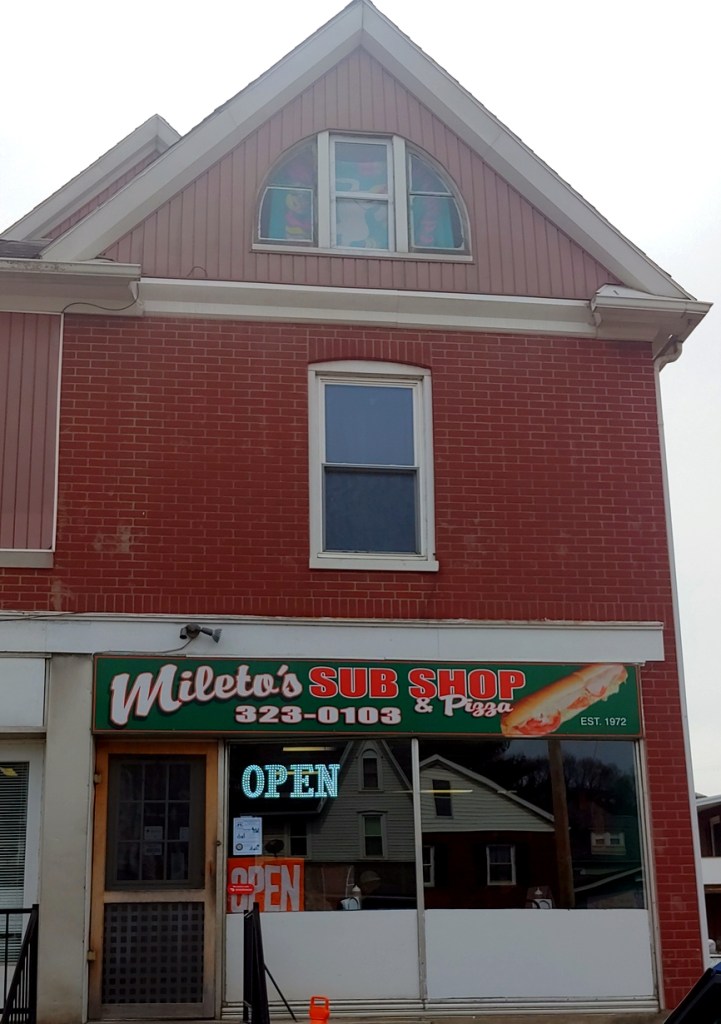 Outside window of Mileto's Sub Shop